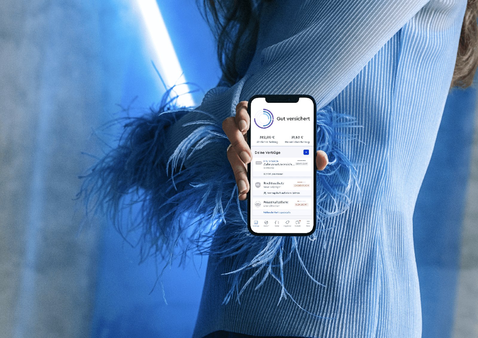 CLARK App product photography — editorial blue model holding the app